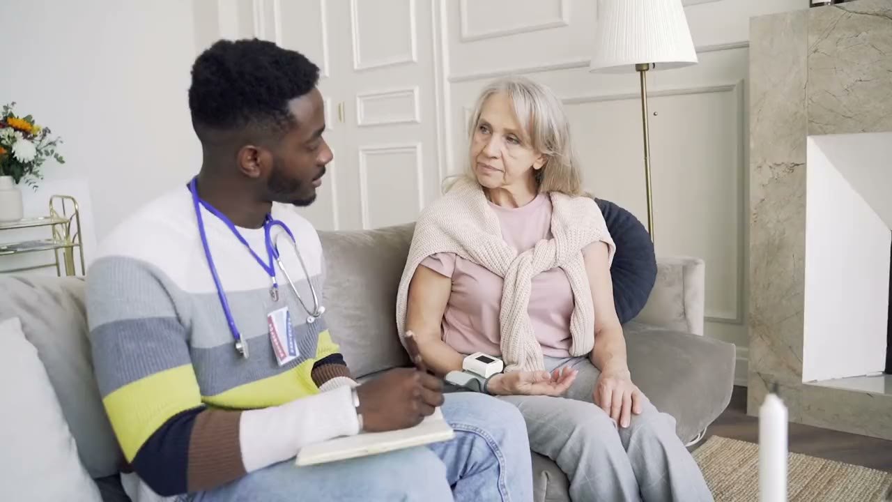 Aquarius carer carrying out a home care assessment with a client
